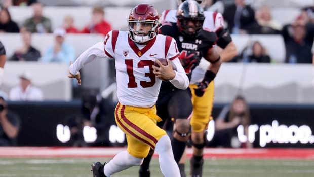 Oct 15, 2022; Salt Lake City, Utah, USA; USC Trojans quarterback Caleb Williams (13) runs against the Utah Utes in the first quarter at Rice-Eccles Stadium.
